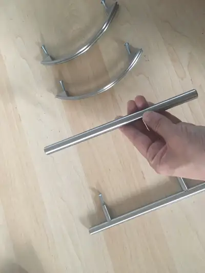 2 Stainless curvy knobs (5-inch hole to hole) -$5 2 Stainless straight knobs (5-inch hole to hole) -...