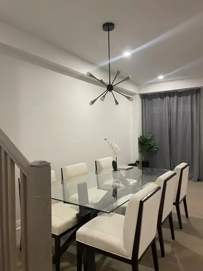 Oversized glass table, with chairs that need to be fixed. Can also just sell the table! Bought set o...