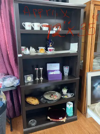 Bookshelf for sale asking $20 obo. not including the items in it. Items in it are for sale though. I...