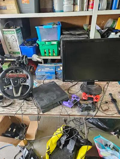 Hello i have a Playstation 4 500gb, Racing wheel with pedals. 3 controllers & comes with a BenQ 144h...