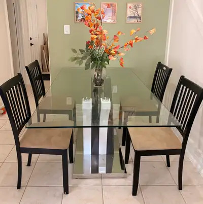 Beautiful glass dining table with four chairs, View more