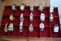 24 Girl’s Watches with 2 display trays. $50