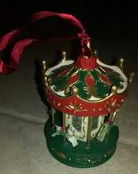 Christmas carousel of ornaments/ santa/ coke