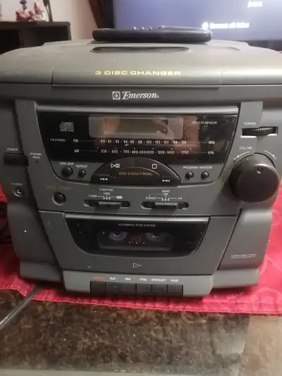 Emerson 3 disc changer with remote and two speakers, View more