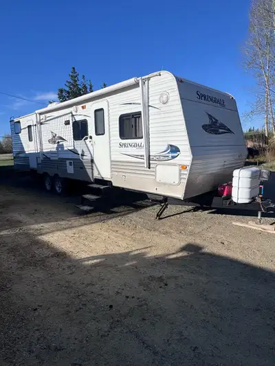 2011 Springdale trailer 32’ Loved and well maintained by our family New brakes/tires/batteries last...