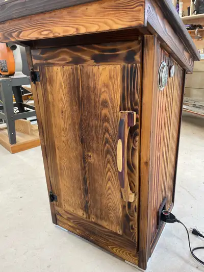 Beautiful cedar smokers with temp control. Lots of work went into building these. All milled from ro...