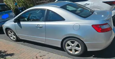 Silver 2009 Honda Civic Coupe (2-door) LX - driven close to 276, 000 km - well maintained (engine oi...
