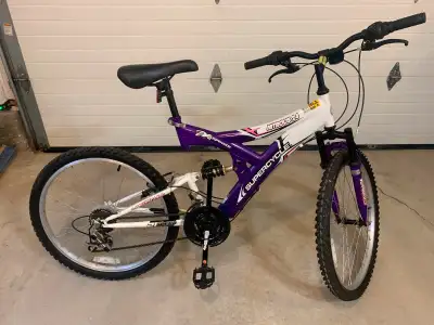 Supercycle mountain bike, 24” wheels. Dual suspension, quick release seat post, 21 speed. Excellent...