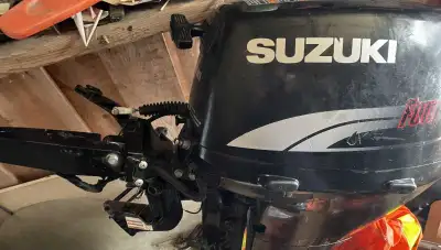 Suzuki 4 stroke outboard motor runs very good hardly used bought bigger motor and boat don't use it...