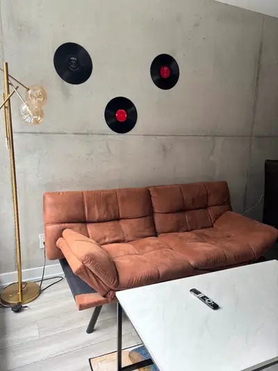 Brown couch, in good condition.