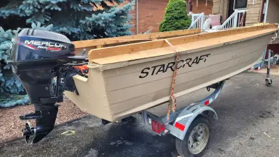 2006 14' Starcraft SF14 duck boat. 1999 15 HP 4 stroke motor. Galvanized trailer. Extremely low hour...