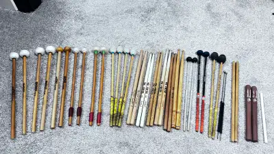 Lot of drum and percussion sticks including: - Timpani mallets - Vibes Mallets - Classic snare drum...