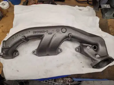 Original left side high performance B or E Body exhaust manifold for a 383 or 440. Casting date is 1...