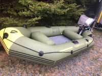  9 foot blowup boat  with a 3 hp Motor