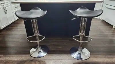 adjustable stools (both included), View more