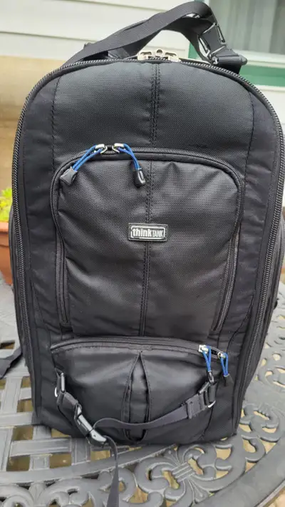 Bag is clean, with lots of dividers and raincover. Side sleeve for laptop. Similar bag on Amazon sel...