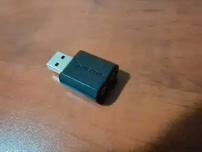This is a used Sabrent USB DAC that provides high-quality audio output, perfect for upgrading your c...