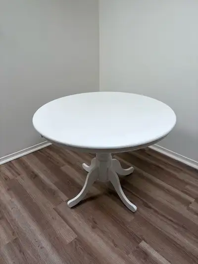 Almost like new round white table. Sturdy.