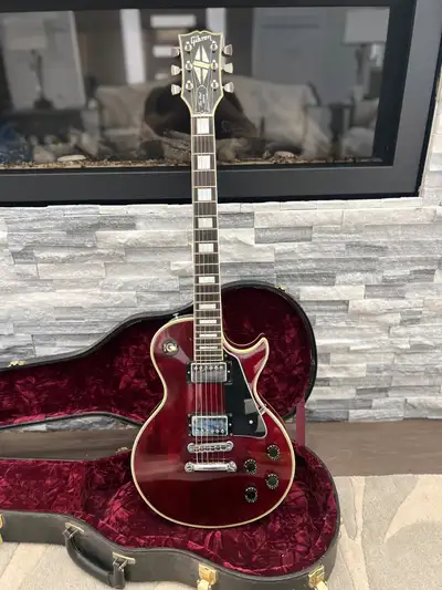 Very clean original 1980 Gibson Les Paul Custom. Wine red with rare factory chrome hardware. No brea...