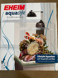 Eheim aqua style 9 gallon aquarium and eheim stand .