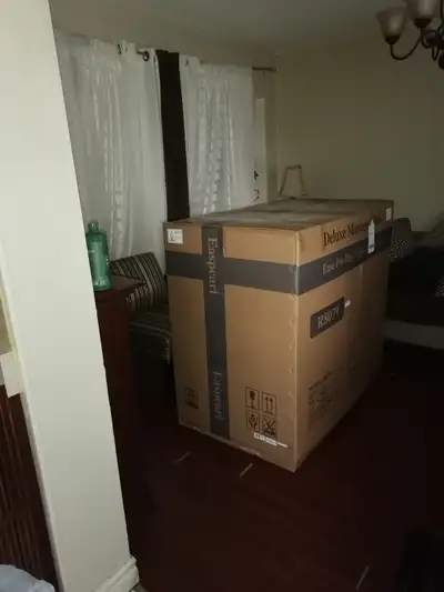 I need 2 guys to move a box from the living room to the basement, View more