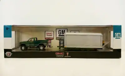 1998 GMC Sierra 1500 4X4 & 1968 Pontiac Firebird 400 H.O. (in trailer) 2023 M2 Machines Auto-Haulers...