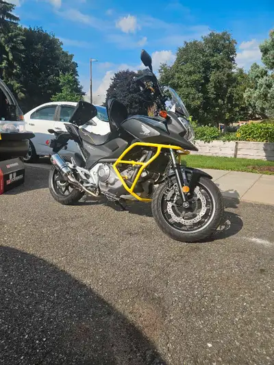 Stupidly low mileage nc700x honda bike with a bunch of upgrades. Previous owner was an older gentlem...