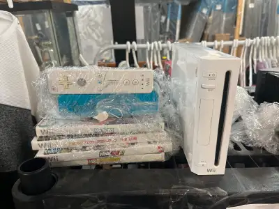 Wii system two controllers 4 games all cords needed , View more