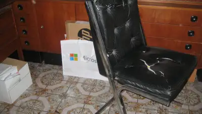 VINTAGE LEATHER COVERED DAMAGED CHAIRS--CHROME STRUCTURE, View more