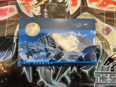 This mint set includes 9 coins in total, including 8 regular coins issued in 2006 and a 10 franc bim...