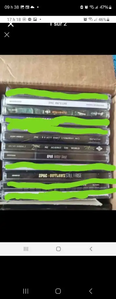 Découvrez un lot de CDs de 2Pac, incluant des classiques comme 'Pac's Life', 'Me Against The World'...