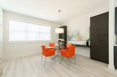 Two bedroom townhouse rental with two car garage, open floor plan, washer, dryer. Close to Western.