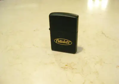 Like New Vintage Brass Black Peterbilt Zippo Wind Proof Lighter, View more
