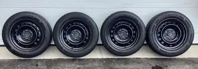 4 Goodyear “UltraGrip Ice” M+S tires w/rims 215/55R16. $200 Load & Speed Rating: 97S (Extra Load). F...