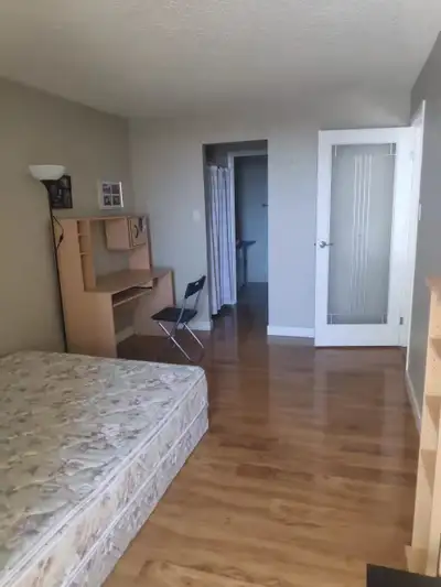 Room with private bath in shared highrise appartment