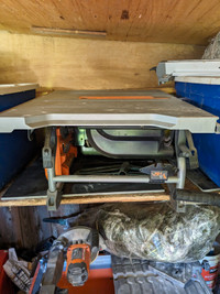 Rigid 10 inch table saw ,hardly used new blade