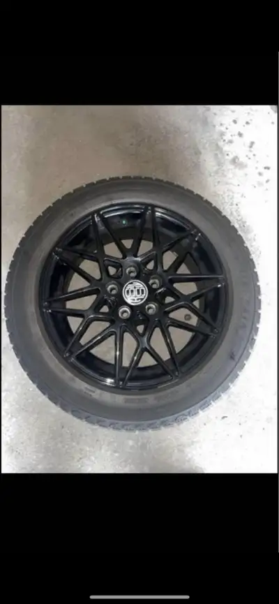 • Only used for half a winter season • $900 total for all four tires and rims not each