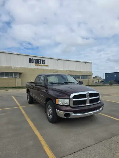 2004.5 ram 2500 5.9 cummins (325hp) 48re 2WD Truck is completly stock besides a bullydog gt tuner an...