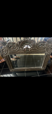 Carved Indonesian antique mirror