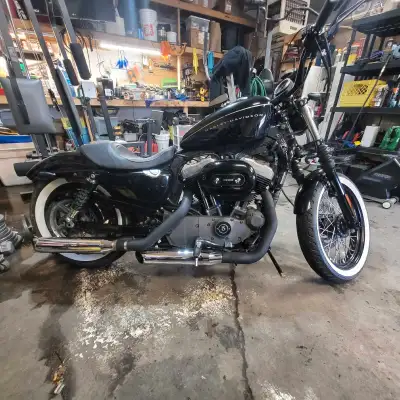 2010 harley xl1200n. Bike runs great and is in working order. Looking to possibly trade for a good r...