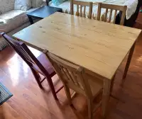 Newly wood dining table with 4 chairs dropoff $