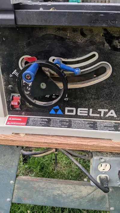 Delta table saw and stand Still works great. Just selling to make space as don't use that much. $120