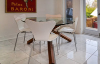Modern designer glass dining table