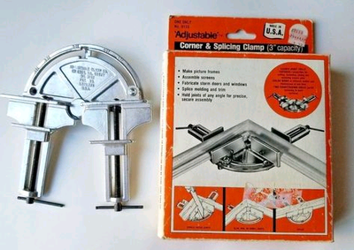 New in box. Two 3" adjustable corner clamps. Made in USA.