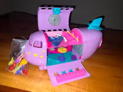 Vintage Polly Pocket airplane with dolls and clothes for sale, View more