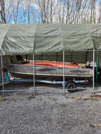 Boat doesn't leak, trailer works awesome, 1960 18HP electric start Johnson needs a gasket in the bot...