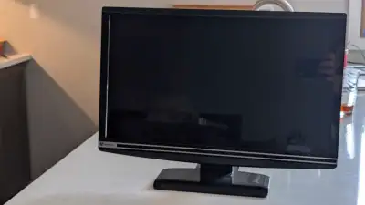 I'm selling a used Gateway LCD monitor, model FHX2300, with a 23-inch screen, perfect for a home off...