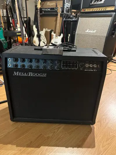 Up for sale is a very clean Mesa Boogie DC-5 1x12 combo. This is a real powerful workhorse of an amp...
