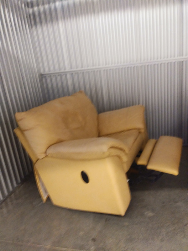 Large, faux leather chair. Reclines, rocks, easy to transport. in Chairs & Recliners in Vancouver