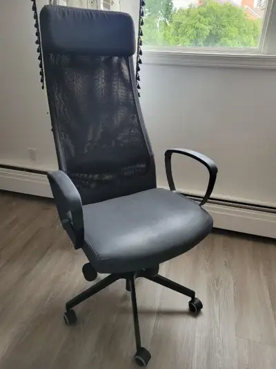 Just your standard IKEA Markus office chair that is a little bit past its prime but can still delive...